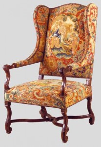 fauteuil à oreilles de style Louis XIV